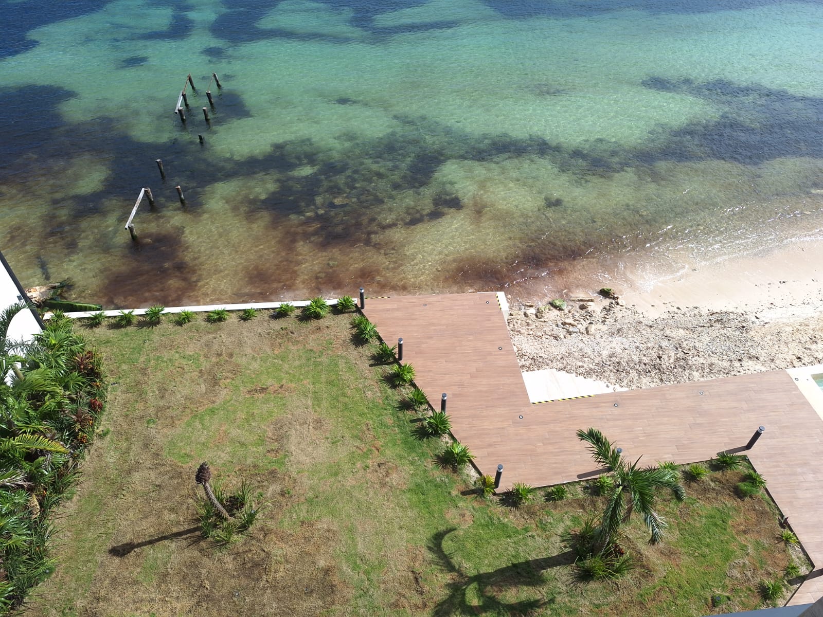 departamento en venta - DEPARTAMENTO NUEVO EN VENTA FRENTE AL MAR EN PUERTO MORELOS | PUERTO MORELOS